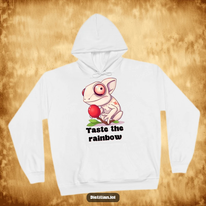 Funny chameleon hoodie showing a giggling chameleon enjoying a bright red berry, designed for comfort and playful vibes.