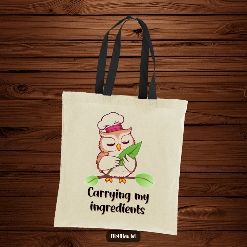 Funny tote bag depicting a wise owl wearing a chef hat, examining a vibrant leaf, practical funny gift.